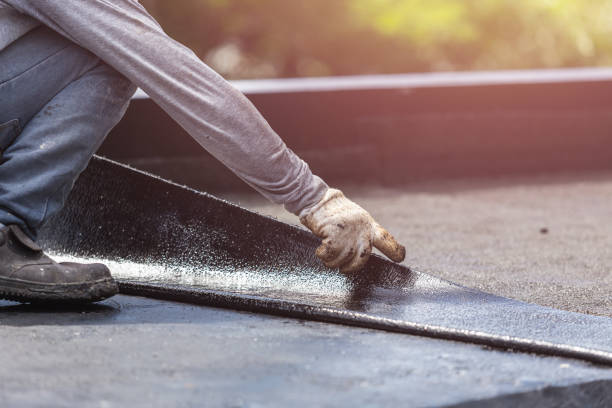 Professional Basement Waterproofing technician working in Sykesville, MD
